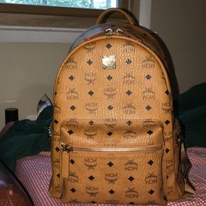 MCM cognac medium stark back pack.